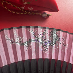 fan surface pattern details: plum blossoms