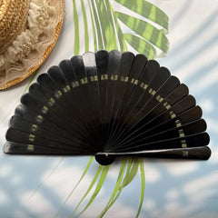 The back side of an East Asian Lacquer Folding Fan (Urushi fan).
