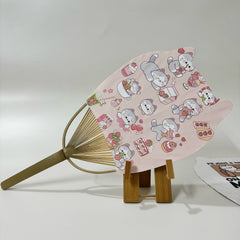 A Japanese round fan (Uchiwa fan) with cat ears. On the fan panel it prints cat pictures.