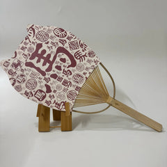 A Japanese round fan (uchiwa fan) with cat ears. On the fan panel it prints Chinese characters says horse.