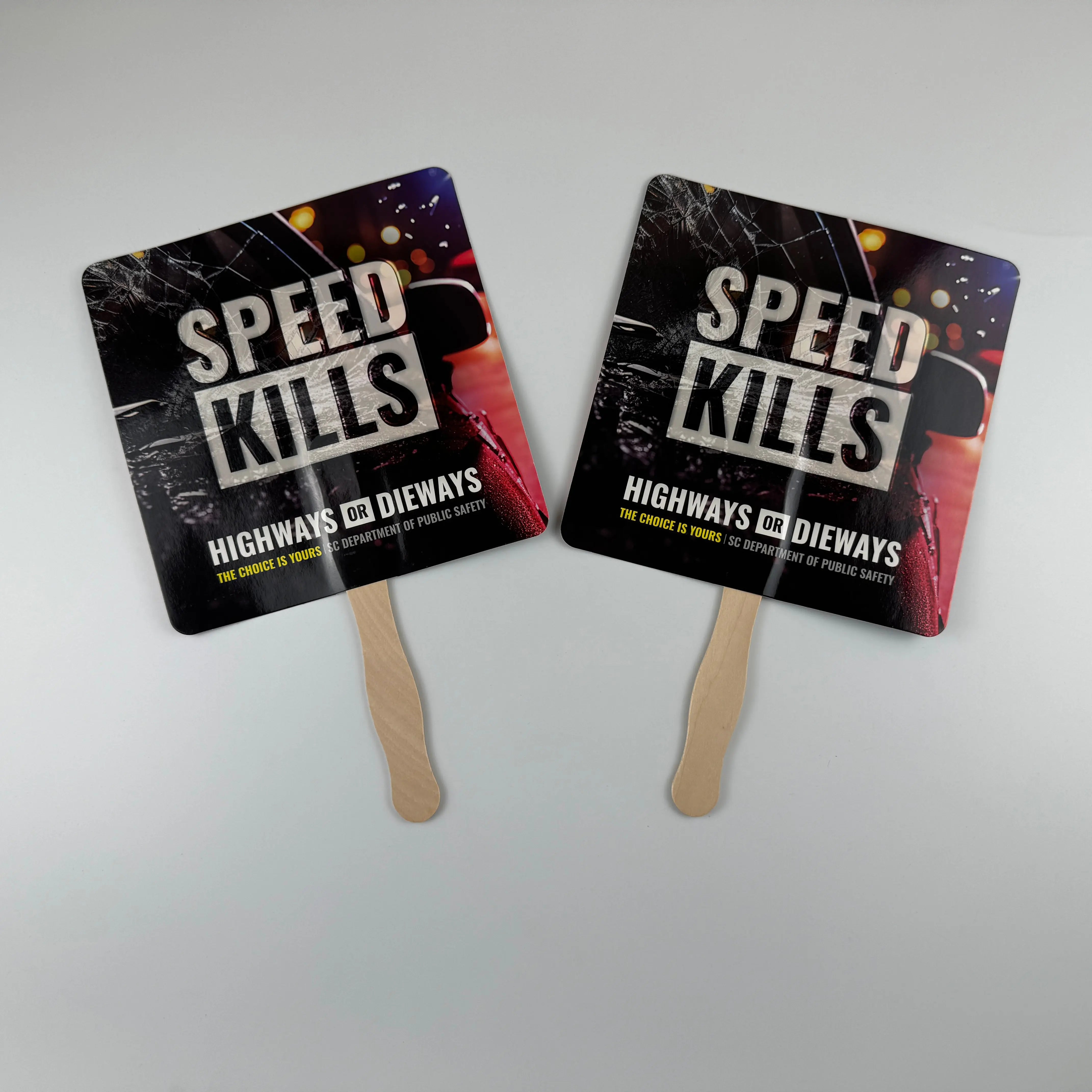 Custom printed promotional paper fans with car speed limit related graphics. Ideal for road safety campaigns and driver education.
