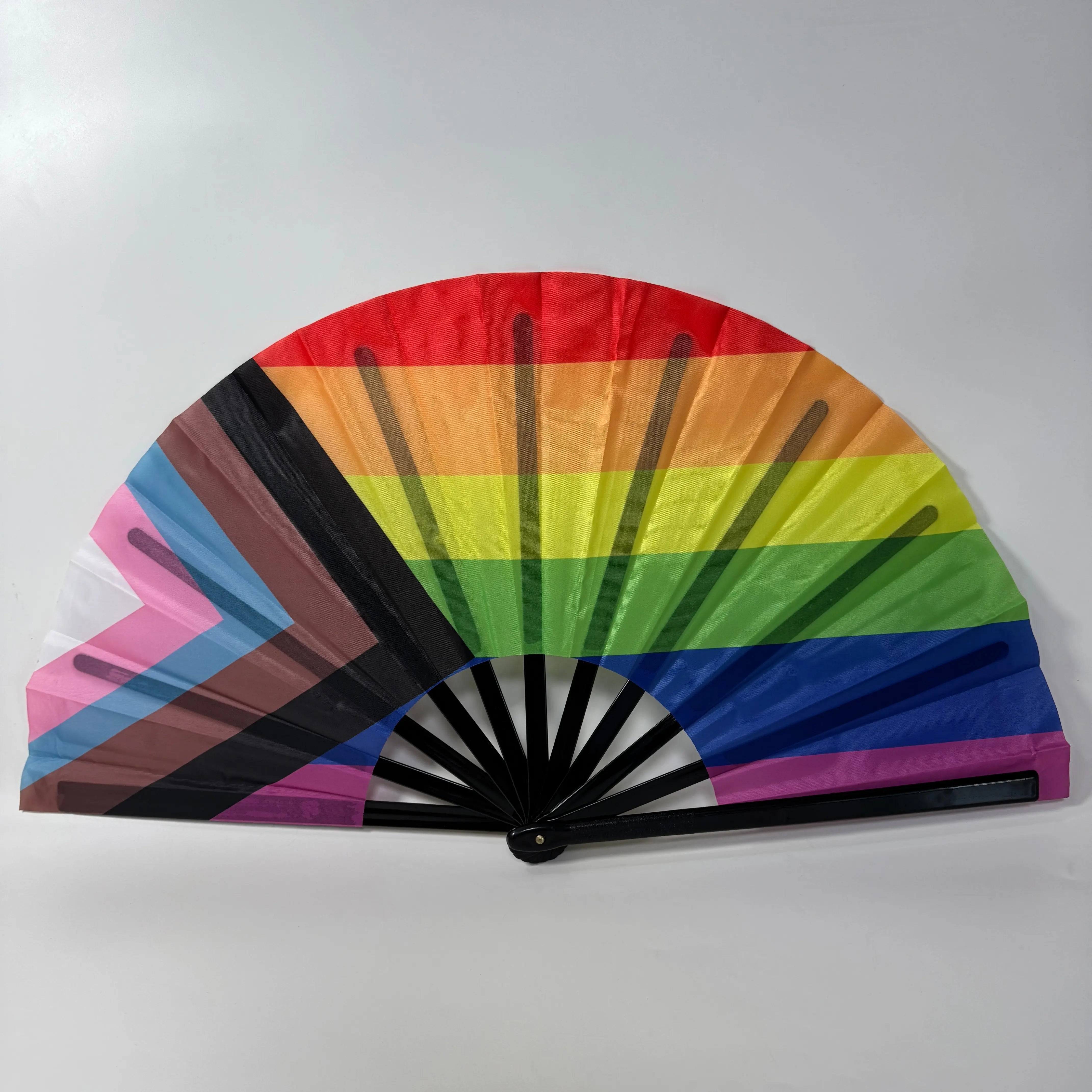 Vibrant rainbow clacking fan, perfect for dance props, rave events, and line dancing (like the "Boots on the Ground" routine).