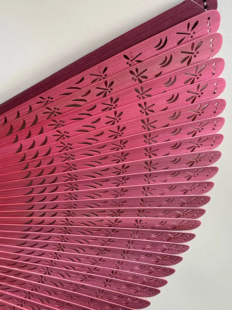 Details of a red touqing bamboo fan