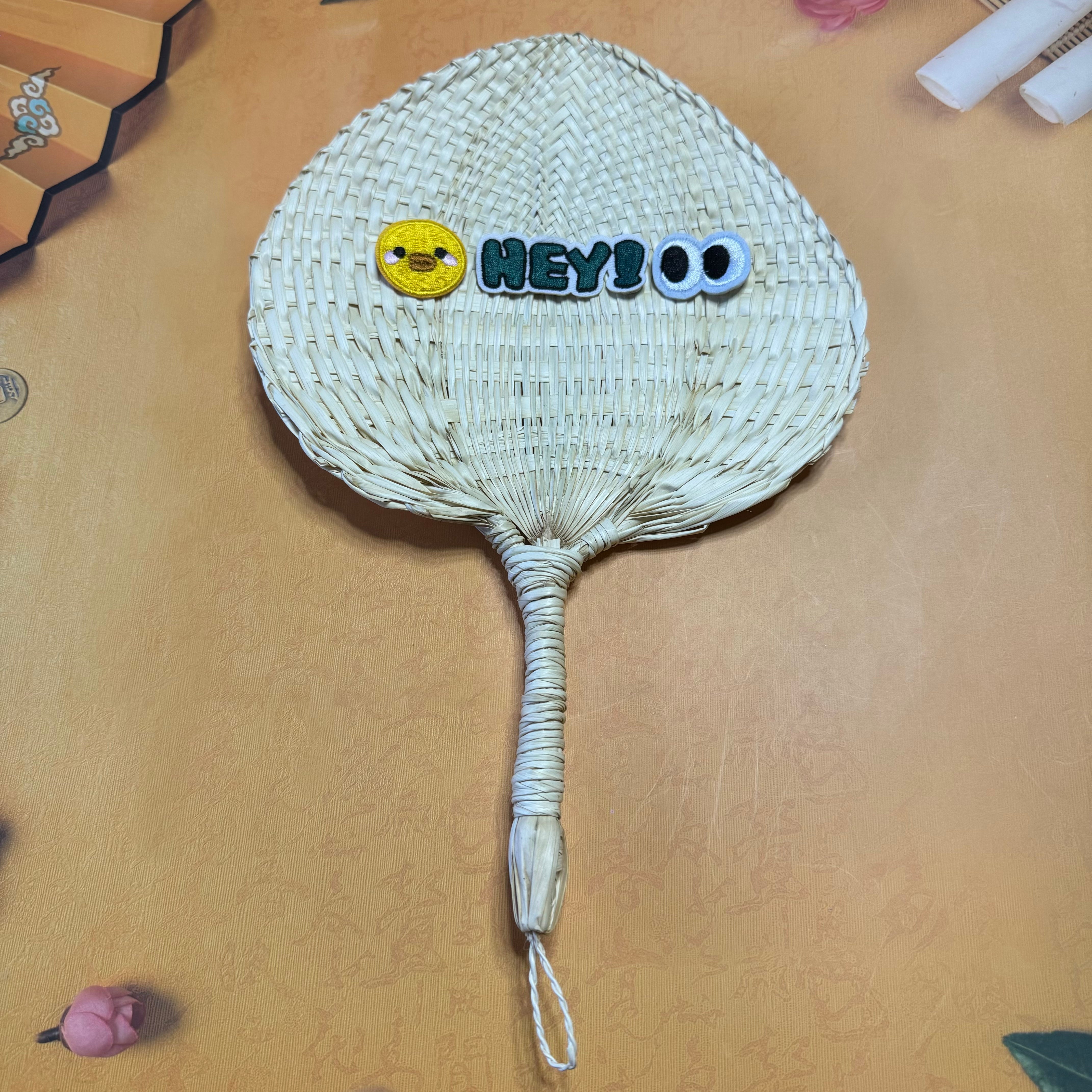 Natural palm leaf hand fan