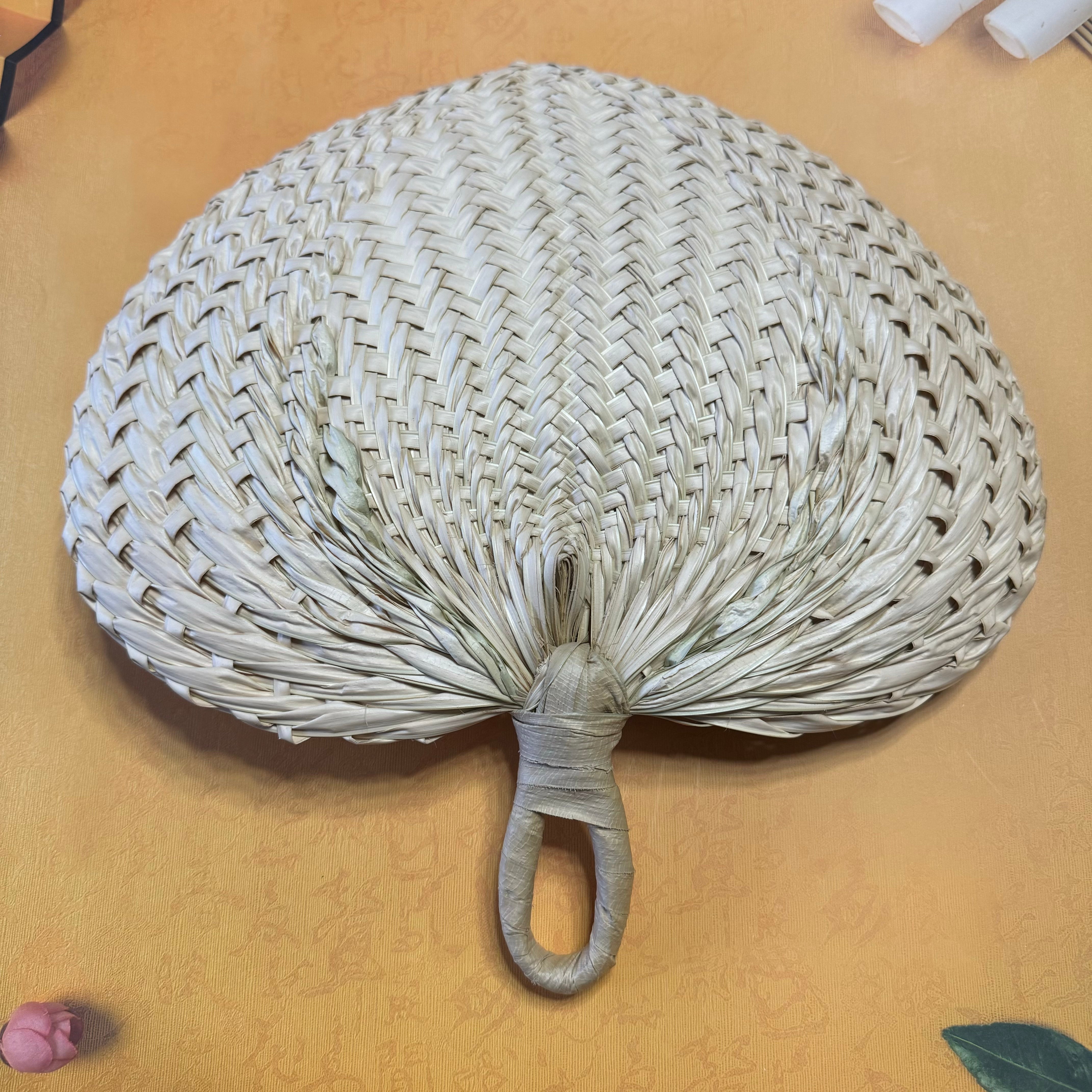 Natural palm leaf hand fan