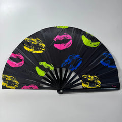 Vibrant kiss mark clacking fan, perfect for dance props, rave events, and line dancing (like the "Boots on the Ground" routine).