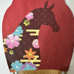 Close-up of a fan panel that prints a horse picture with flowers on the horse's body.